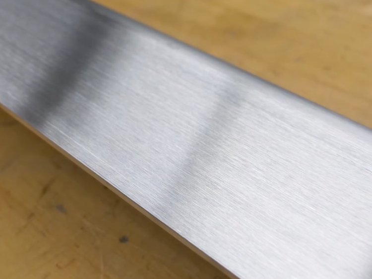 grained finish example on steel part