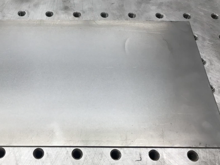 patternless sanding finish on metal part